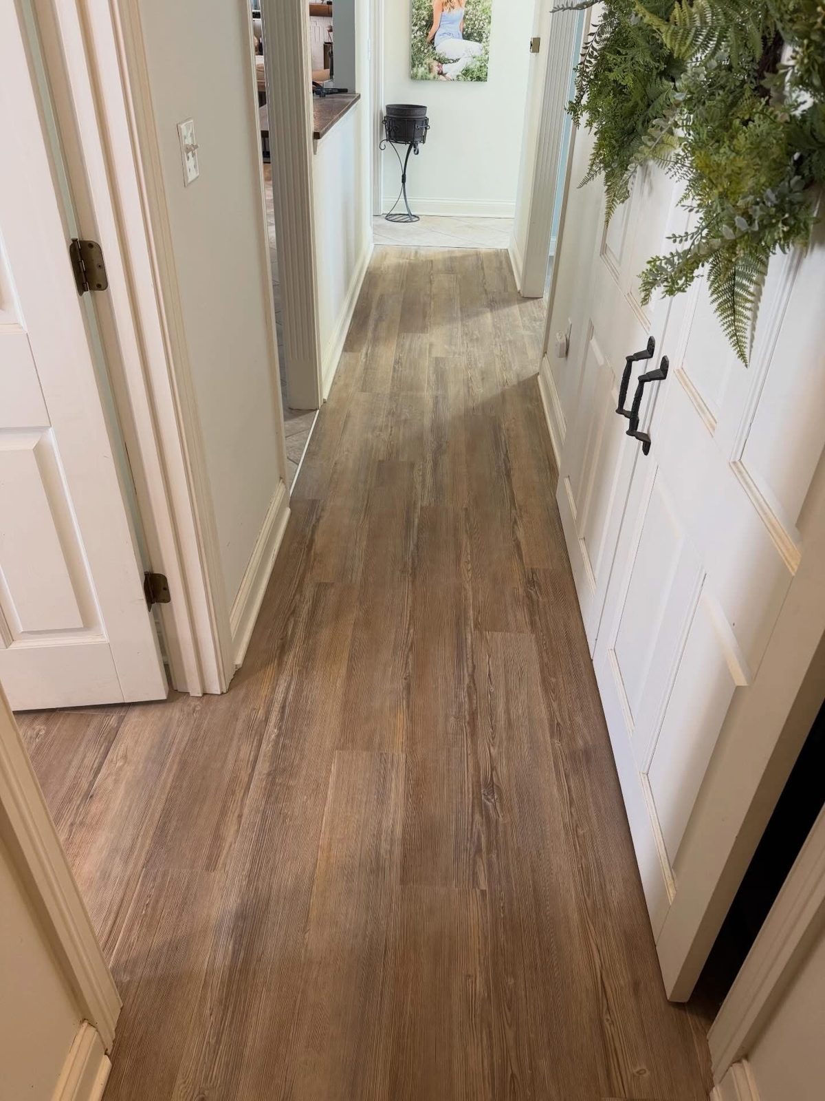 LVP flooring running continuously through a Dayton, OH hallway